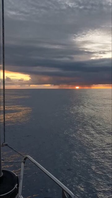 The ocean between Lisbon and Horta was not gentle—it demands patience, courage, and the quiet strength to face what cannot be controlled.
We have sailed the first two nights where the stars hid behind black clouds,
and days when the horizon seemed impossibly far.
Waves slammed against MICA all the way.

Now, the sun lowers itself into the sea,
spilling fire over silver water,
and the world feels both endless and at peace.

#LisbonToHorta #AtlanticCrossing #SunsetAtSea #SailingLife #FromStormToCalm #AzoresBound