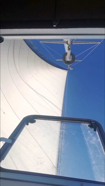 My favorite view from my cabin
Looking up at the sail, it feels as if the sky itself is pulling us forward.
The wind hums through the rigging, steady and sure. 
Out here, there is no rush—only rhythm.
The mast rises like a quiet monument to perseverance, and the sail dances, carrying our journey in its folds.
Each gust is a gift, each wave a gentle reminder:
progress is made not in sudden leaps, but in the patient trust that the wind will come, and we will be ready to take it.

#LifeUnderSail #LisbonToHorta #AtlanticCrossing #WindAndCanvas #OceanPerspective #SailingLife